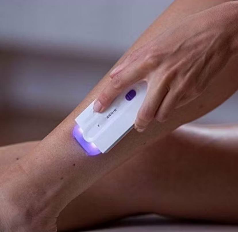 Depilador Laser Flex em uso na perna